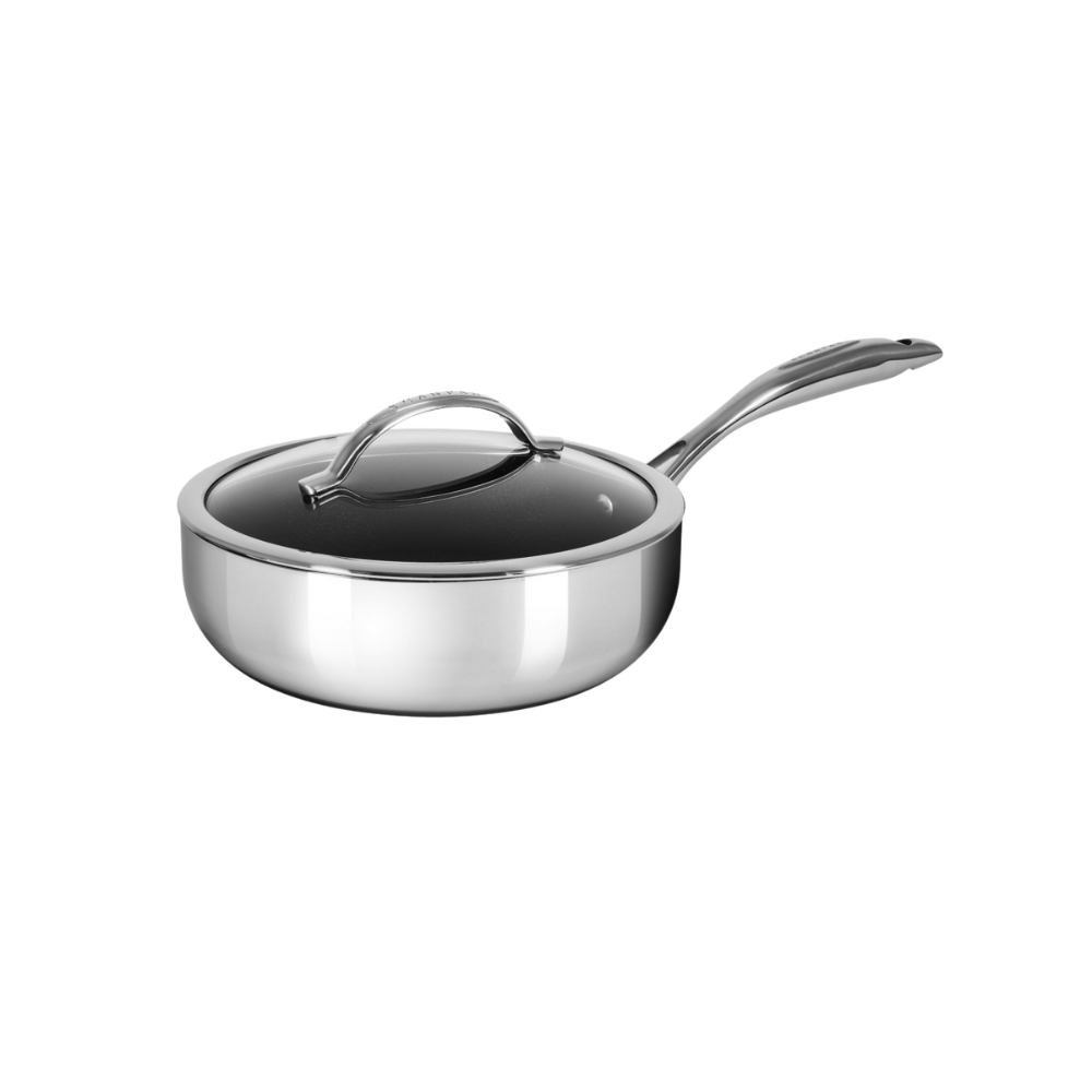 Stainless steel saucepan with lid on a white background