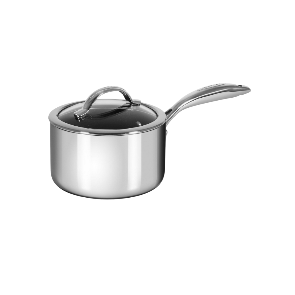 Stainless steel saucepan with a lid on a white background